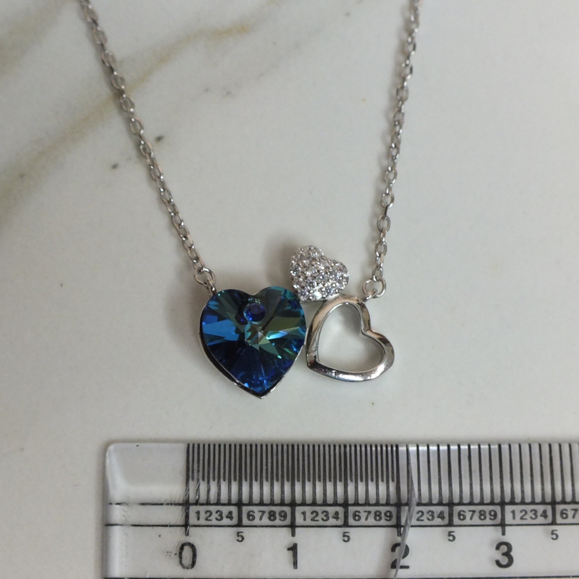 Blue Stone Hearts Necklace- سلسال قلوب بحجرازرق Blue Stone Hearts Necklace- سلسال قلوب بحجرازرق